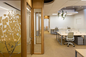 office interior at the Fairmont Royal York Hotel with a cluster of Hemisphere Pendant Planter Lights hanging over desks