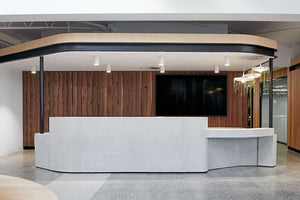 Reception desk of Altona Civic centre with a cluster of Babylon Lights hanging above the counter