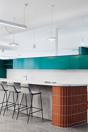 Babylon lights hanging above a tiled kitchen area in the Altona Civic Centre