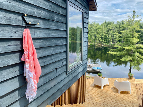 Yoke hook mounted on exterior wall of cottage overlooking lake