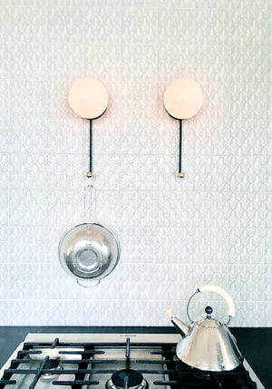 Hook Sconces above kitchen counter of cottage