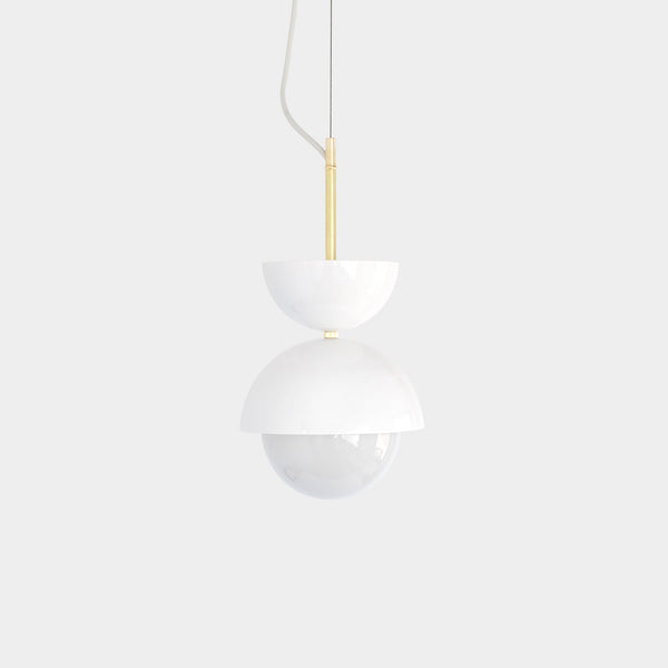 A white pendant planter with a hemispherical shape suspended by a gold-colored chain, against a plain background.