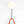 Hook Sconce is a wall light with integrated hook holding a leather satchel