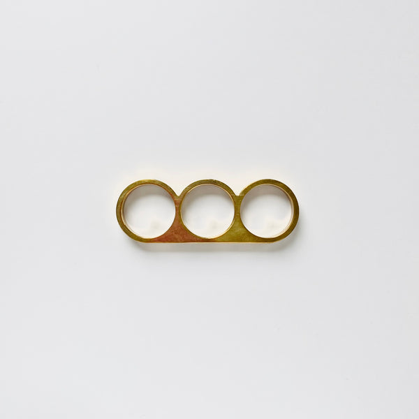 Punch cabinet pulls in polished gold brass is a ergonomically handle for kitchen and bathroom cabinets and drawers